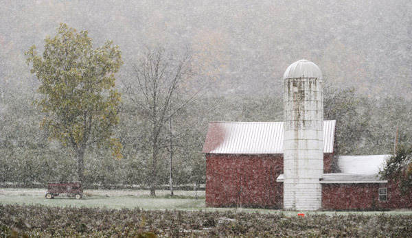Snow falling on farm in Pennsylvania